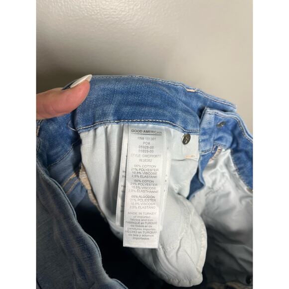 Good American High Rise Flattering Light Wash Busted Knee Raw Hem Jeans - Picture 5 of 6